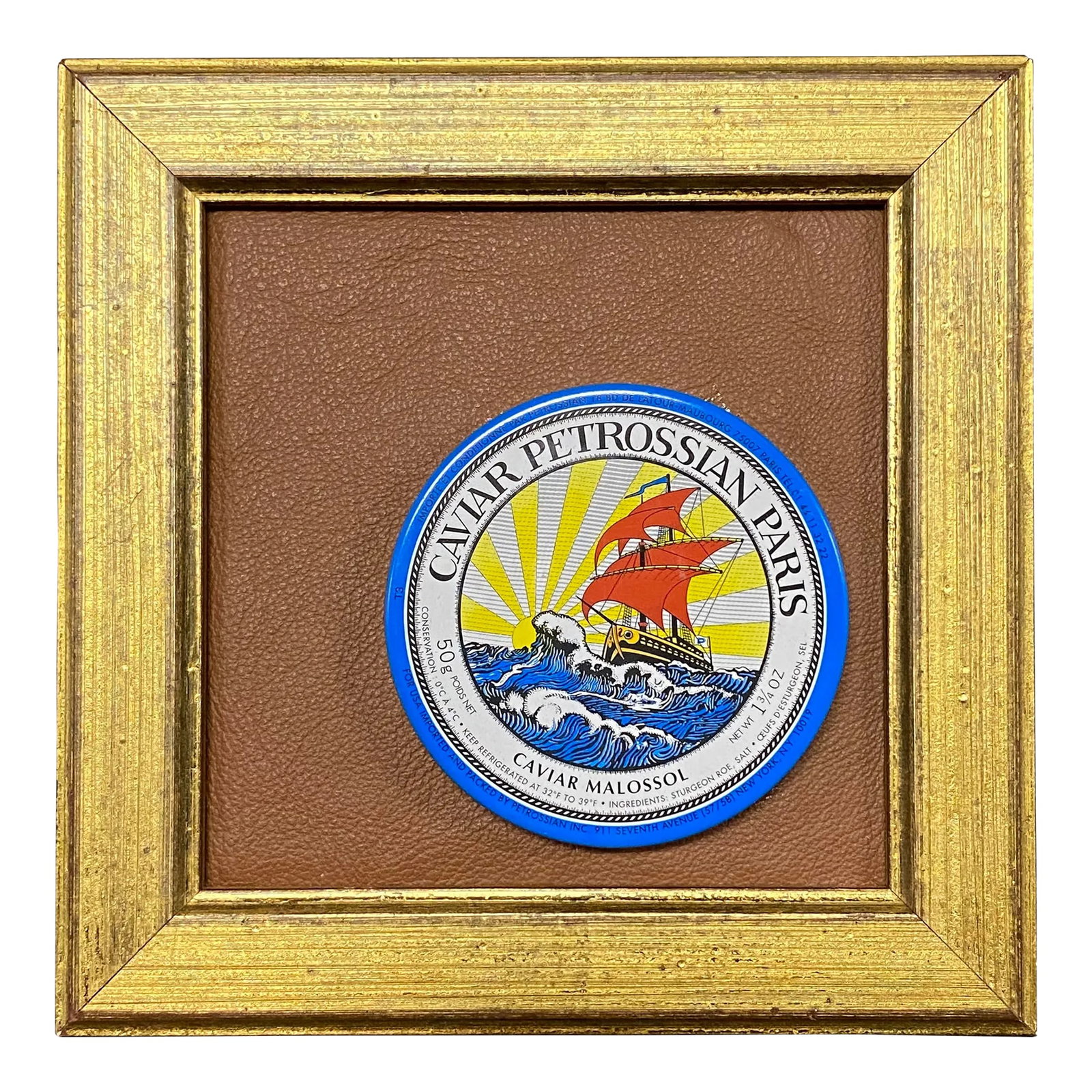 Mounted Caviar Tin on Leather Framed in Vintage Gilt Wood Frame: One of a kind, sculptural wall art object created from an actual caviar tin, mounted to leather and framed in a 1960s gilt wood vintage frame. Somewhat surrealist in feel, with rich, vivid, saturated