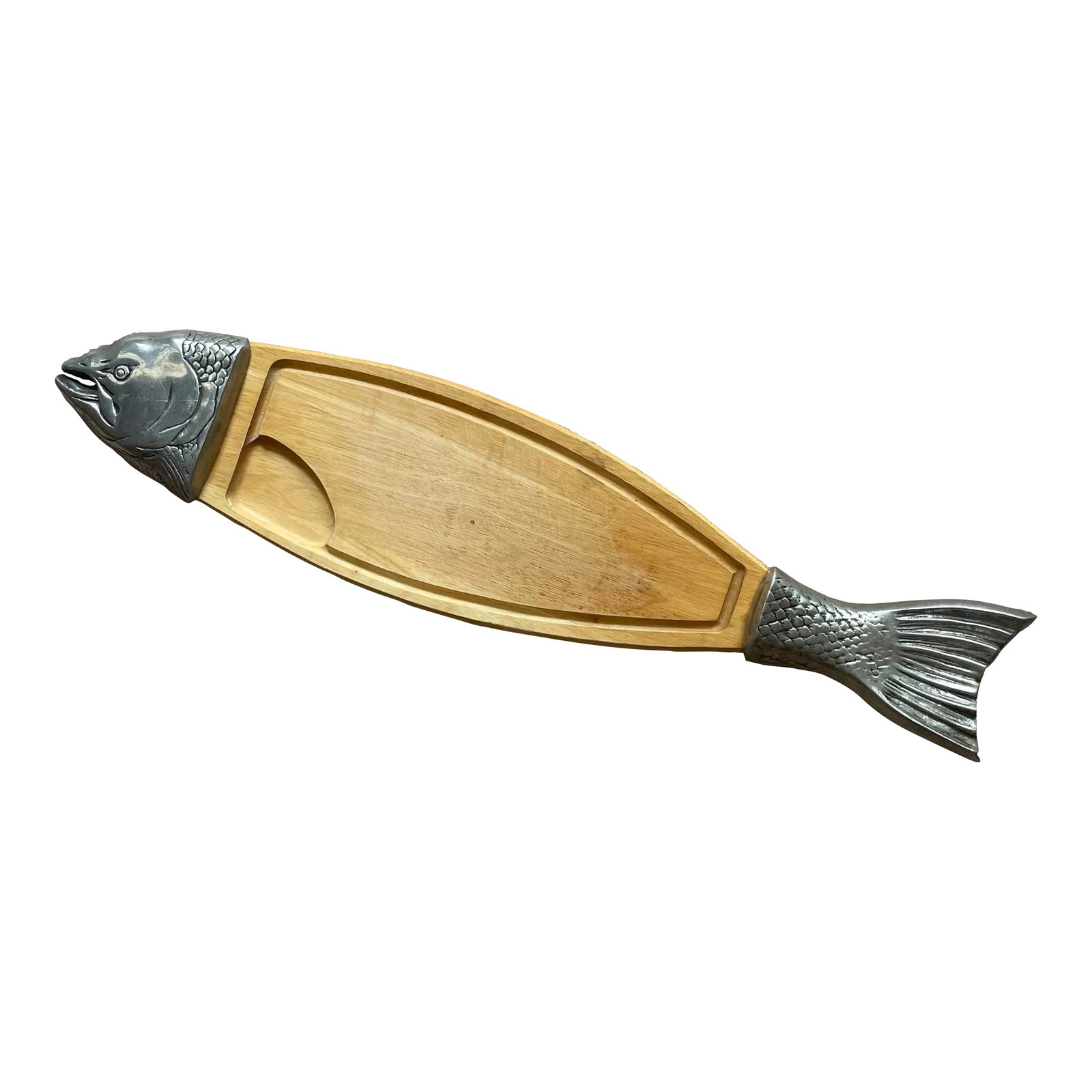 1970s Large Wood and Metal Fish Cutting Board and Server: This fantastic piece is in the shape of a Salmon and perfect for cutting and serving cooked fish or as a passing tray for h'ordeuvres. The center is a blond wood with the head and tail formed in