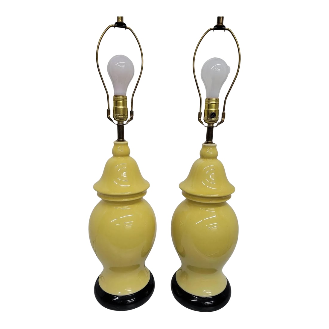 Mid Century Hollywood Regency Yellow Ceramic Ginger Jar Yellow Table Lamps - A Pair: Bring a vibrant pop of color and classic Chinoiserie flair to your space with this striking pair of vintage mid-century ceramic ginger jar table lamps. Featuring a bold, sunny yellow glaze contrasted