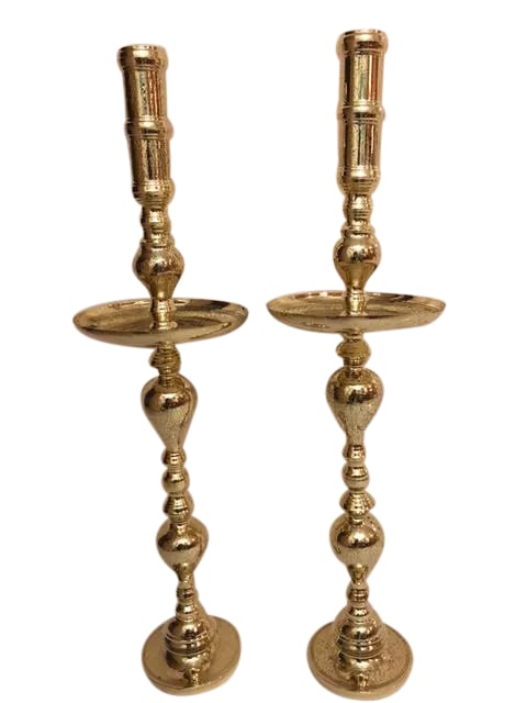 Antique Architectural Gothic Church Paschal Alter Brass Candlesticks - A Pair: Height: 40 inches Drip Tray or bobeche: 10 inches Shipping done from our Detroit Warehouse. Condition: Condition Notes: Excellent - Minor wear consistent with age and history Materials &
