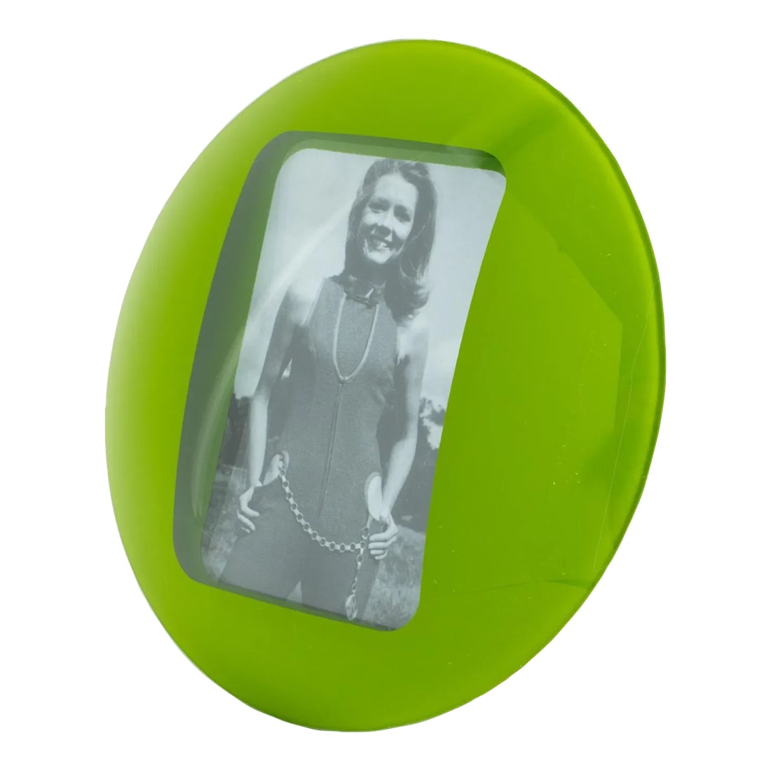 Space Age Green Glass Picture Frame: Stylish 1960s Space Age green glass picture photo frame. Round domed design with kinetic effect. The easel and the back are covered with black paper. The photo frame can only be displayed in the portr