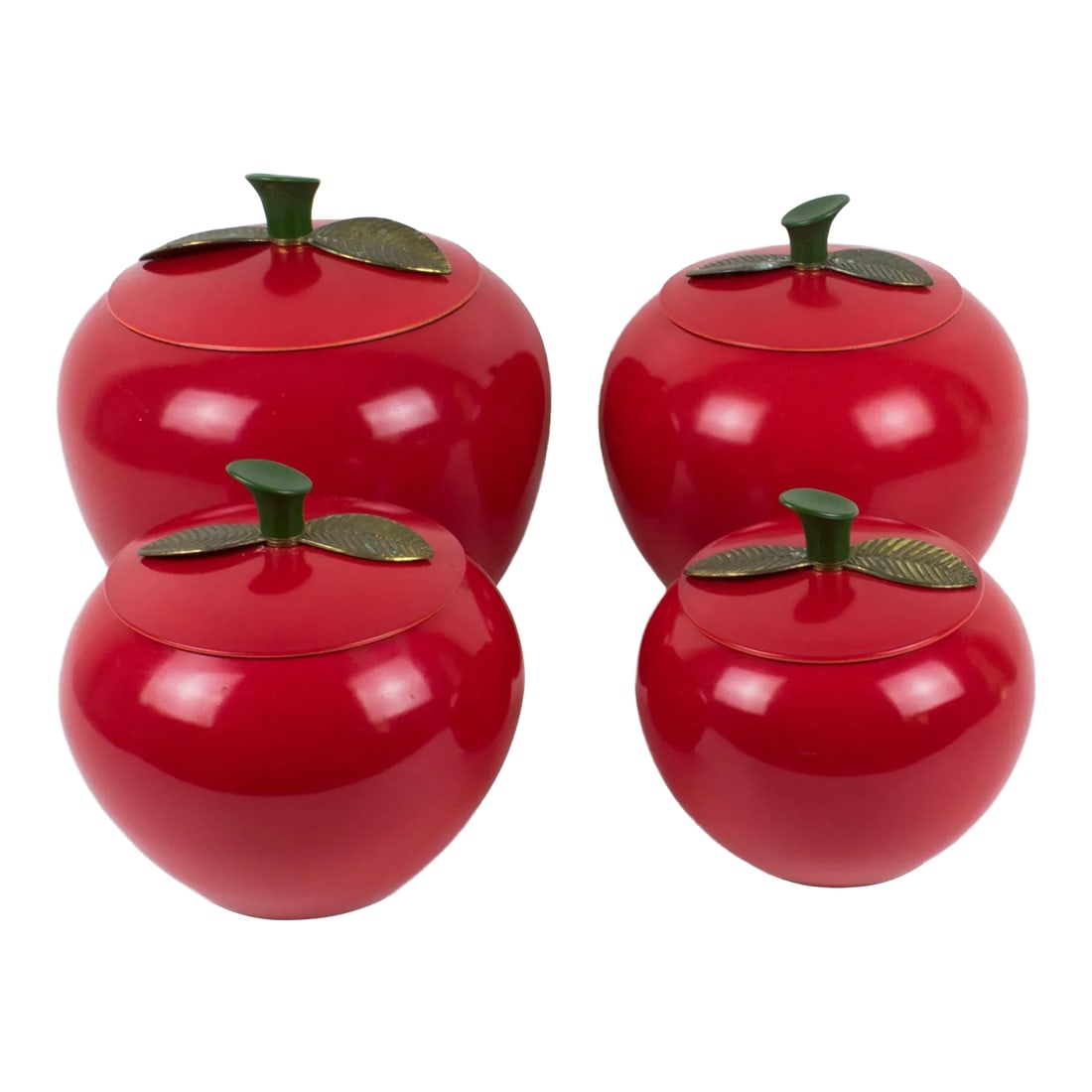 Mid-Century Kitchen Canister Cookie Jar Red Enamel Aluminum Apple, Set of 4 Pc: Those cute Mid-Century-Modern 1960s kitchen canister or cookie jar set features an apple-shaped container in red enamel aluminum in assorted graduated sizes. You have four pieces in this set. The