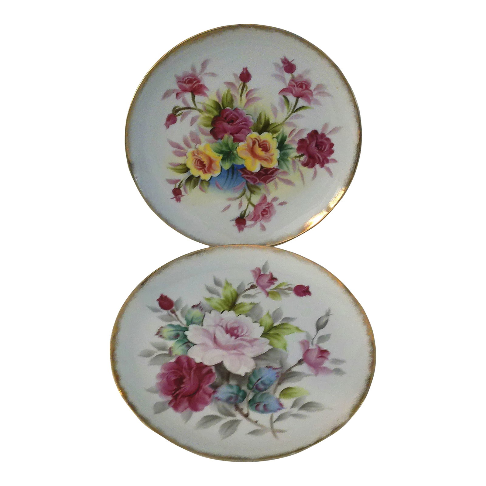 Mid-Century Large Hand-Painted Cottage Rose Display Platters, a Pair: Beautiful pair of white porcelain display platters each featuring a vibrant, hand-painted rose motif on face with gold rims. Holes on back should desire to display hanging. Condition: Alterations: