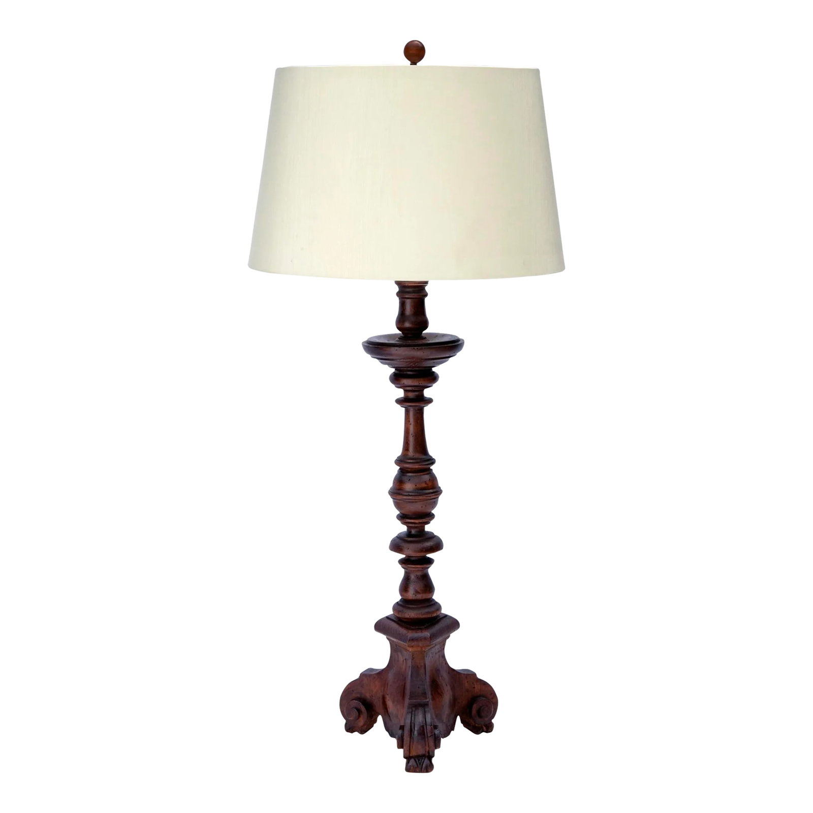 Chapman Vintage Wood Candlestick Lamp: Hand carved candlestick lamp by Chapman Manufacturing company with dark walnut finish. Polished brass lamp works providing directional lighting with two light sources. New linen shade is included. Con