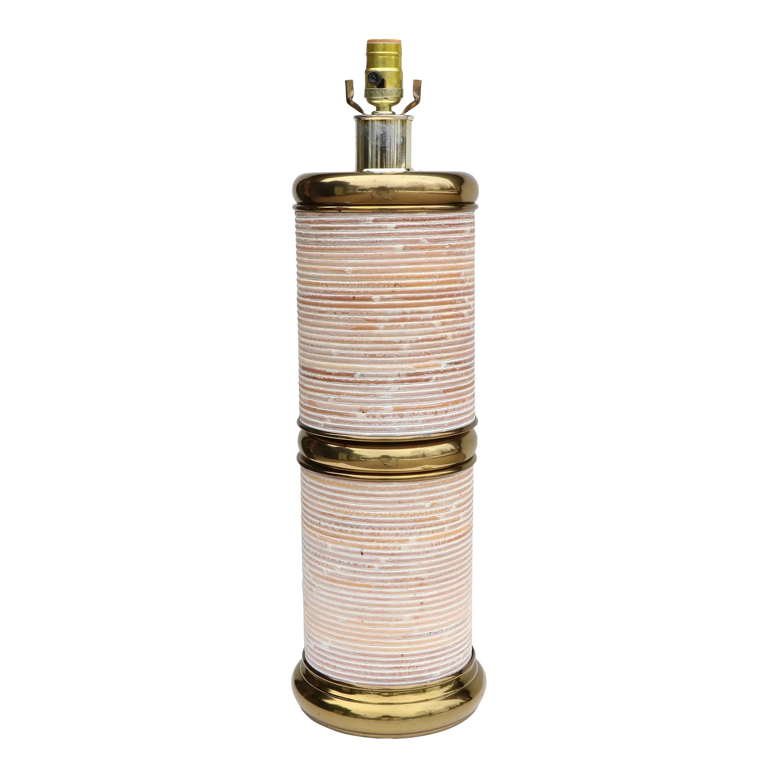 Cerused Reed & Brass Table Lamp: Vintage coastal table lamp with a tall cylinder form. Chic wrapped split reed construction with a washed finish. It has a multi-hued striped design. This lamp measures 32.5" tall to the top of its
