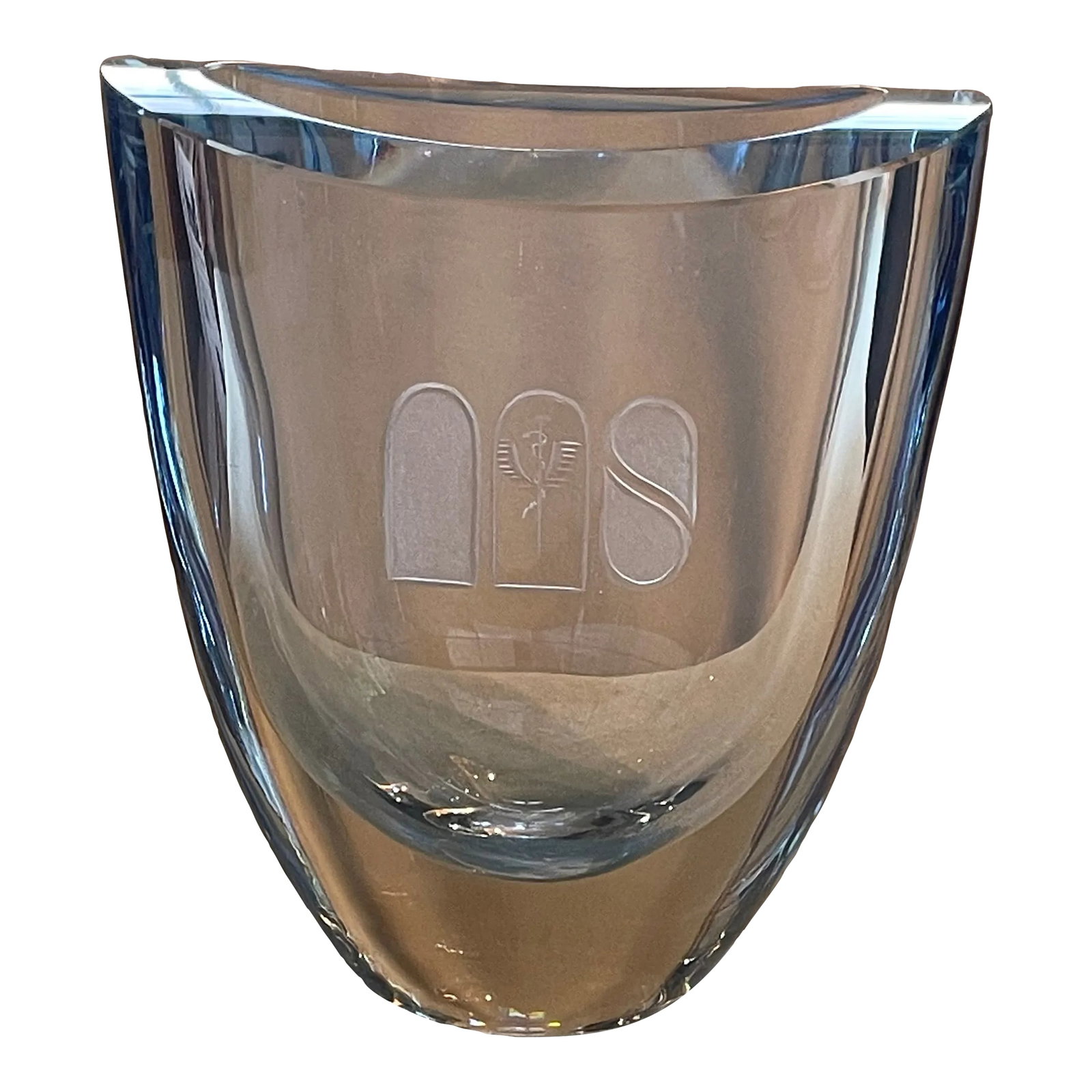 Mid-Century Strombergshyttan Swedish Ice-Blue Art Glass Vase: Gorgeous ice-blue Strombergshyttan mid-century Swedish vase. Very heavy with thick, curving sides and an oval, curved top, etched with a lovely design and signed (hard to see) on the bottom. Probably