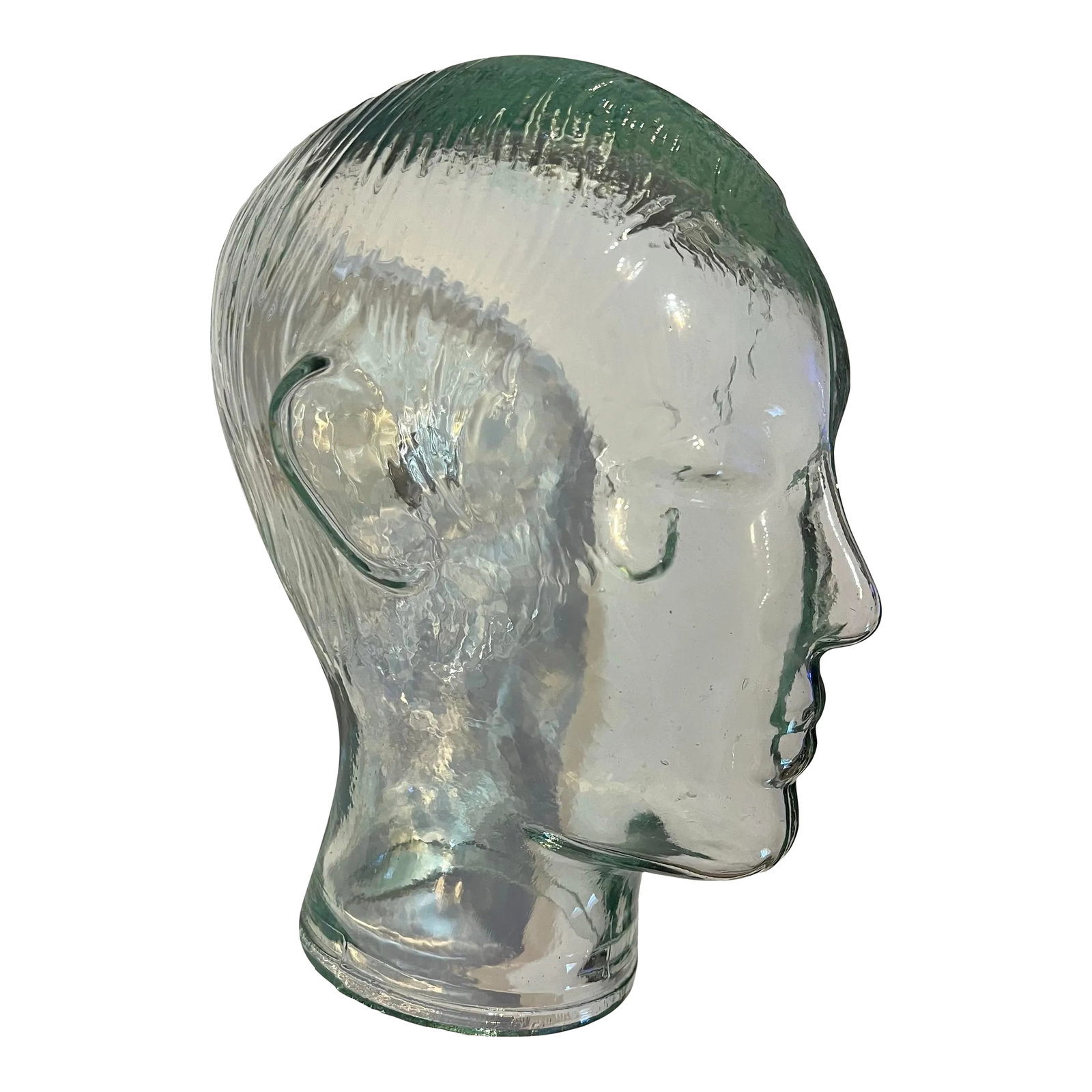 Vintage Glass Head/ Bust Statue: Vintage whimsical clear glass with a green tint. Lot of detail glass mannequin head. Stands 8" tall. Base opening is 4" in diameter. Wig or hat display . Decorative item on a shelf or table. Condition