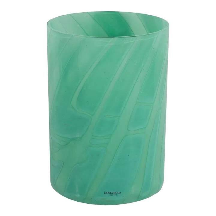 Anne Ehrner Kosta Boda "Primavera" Green Glass Vase: A Primavera glass vase designed by the Swedish glass artist Anne Ehrner (born 1948) for Kosta Boda. Made in Sweden, this cylindrical vase is made from a green glass with swirling and layered design. T