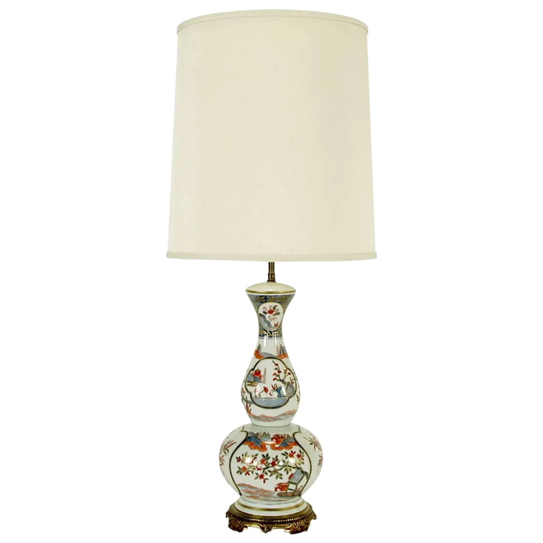 Hand-Painted French Porcelain Chinoiserie Table Lamp: Hand-painted asian inspired table lamp. Porcelain body made in Paris France, hand-painted by J Poncet, brass base and brass double socket cluster with drop chain switch pulls. Sold sans shade. Conditi