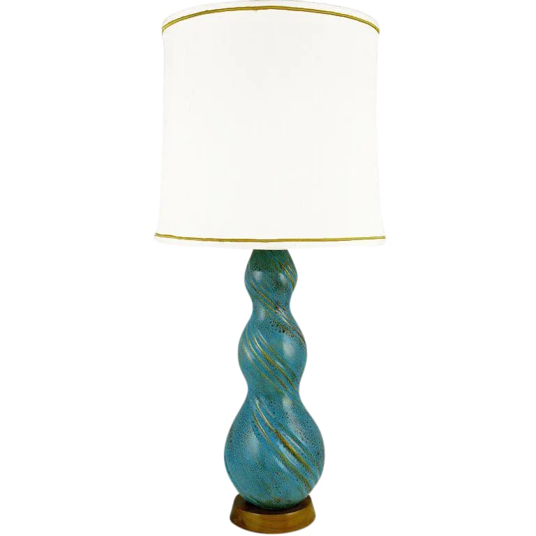 Aqua Blue Triple Gourd Form Pottery Table Lamp: Vibrant and exquisitely textured aqua blue pottery with swirling chocolate brown and gold design, atop walnut base. Sold sans shade. Condition: Alterations: Original Condition Unaltered Imperfections: