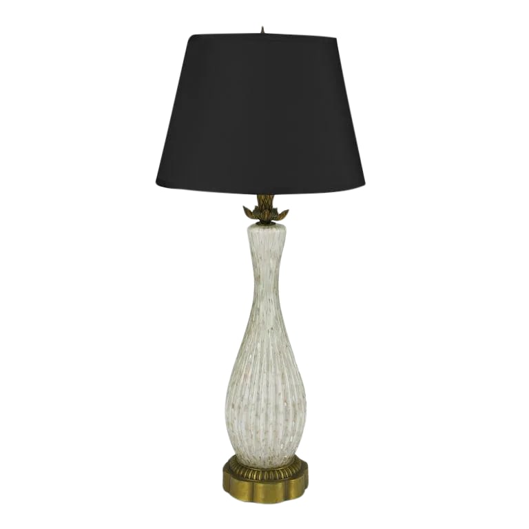 Murano Cordonato d'Oro Fluted Glass Table Lamp: Elegant gold flecked translucent Murano glass vase bodied table lamp with cast brass base. Solid cast brass floral bobeche and pineapple spacer with brass socket and harp. Sold sans shade. Condition: 
