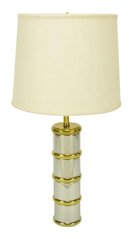 Chrome & Brass Segmented Column Table Lamp.: Post modern table lamp with chrome column and brass rings, cap and stem. Similar to designs by Laurel Lamp. Condition: Alterations: Original Condition Unaltered Imperfections: Some Imperfections