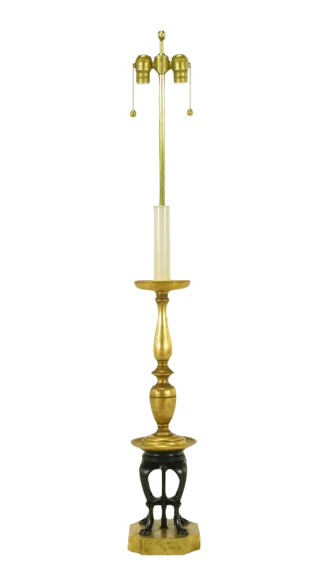 1960s Gilt & Black Lacquer Regency Table Lamp: Gilt and black lacquer wood base Regency table lamp. Plinth base with a cabriole leg and paw foot support, gilt wood spindle and gilt metal bobeche. Ivory lacquer candle with brass stem and double soc
