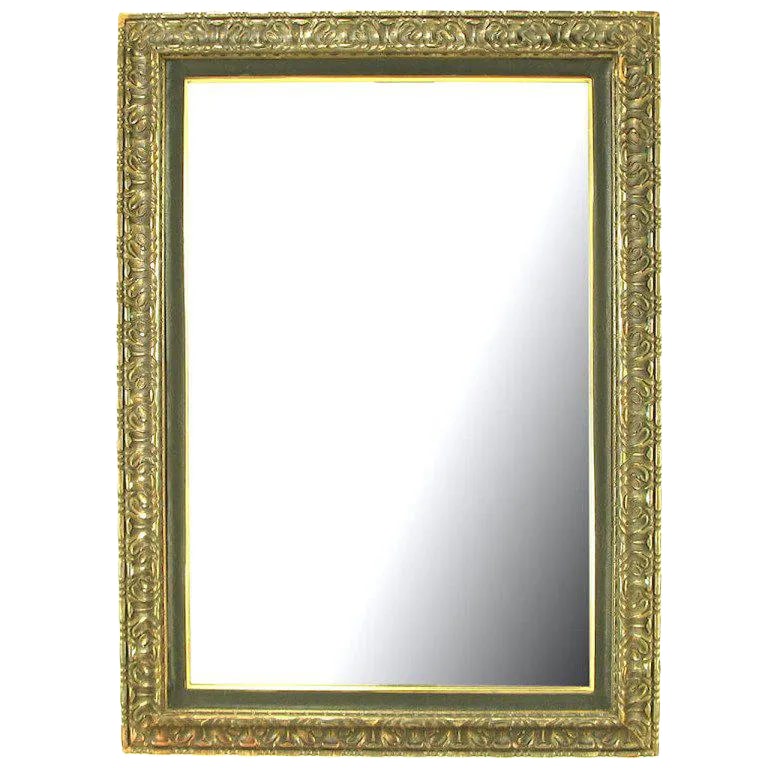 Carved & Gilt Wood Egyptian Style Wall Mirror: Hand carved and gilt wall mirror with leather like inner border and brass beading. Condition: Alterations: Original Condition Unaltered Imperfections: Some Imperfections Condition Notes: Very good vin