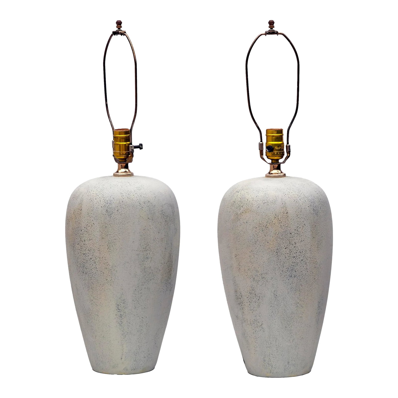 1970s Faux Cement Resin Lamps a Pair: Illuminate your space with these Postmodern cast resin lamps with a cement like grayish beige finish with an elongated timeless silhouette. Original wiring is in good condition. The lamp was