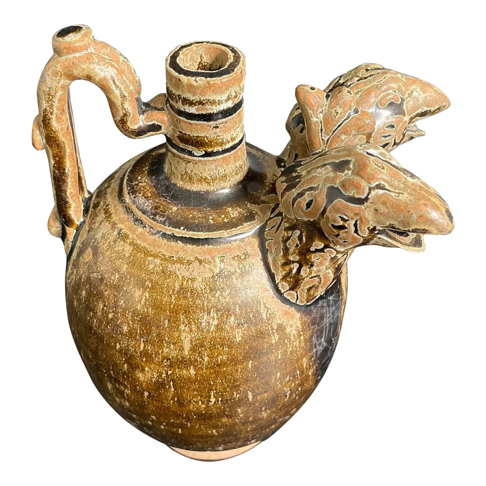 Tang Dynasty Brown Glazed Ceramic Ewer With Double Spout in the Form of Bird Head: A 19th-Century reproduction of an ancient Chinese brown glazed ceramic ewer from the Tang Dynasty. This pitcher, likely for serving liquors, features a distinctive bird head figural double-spout desig