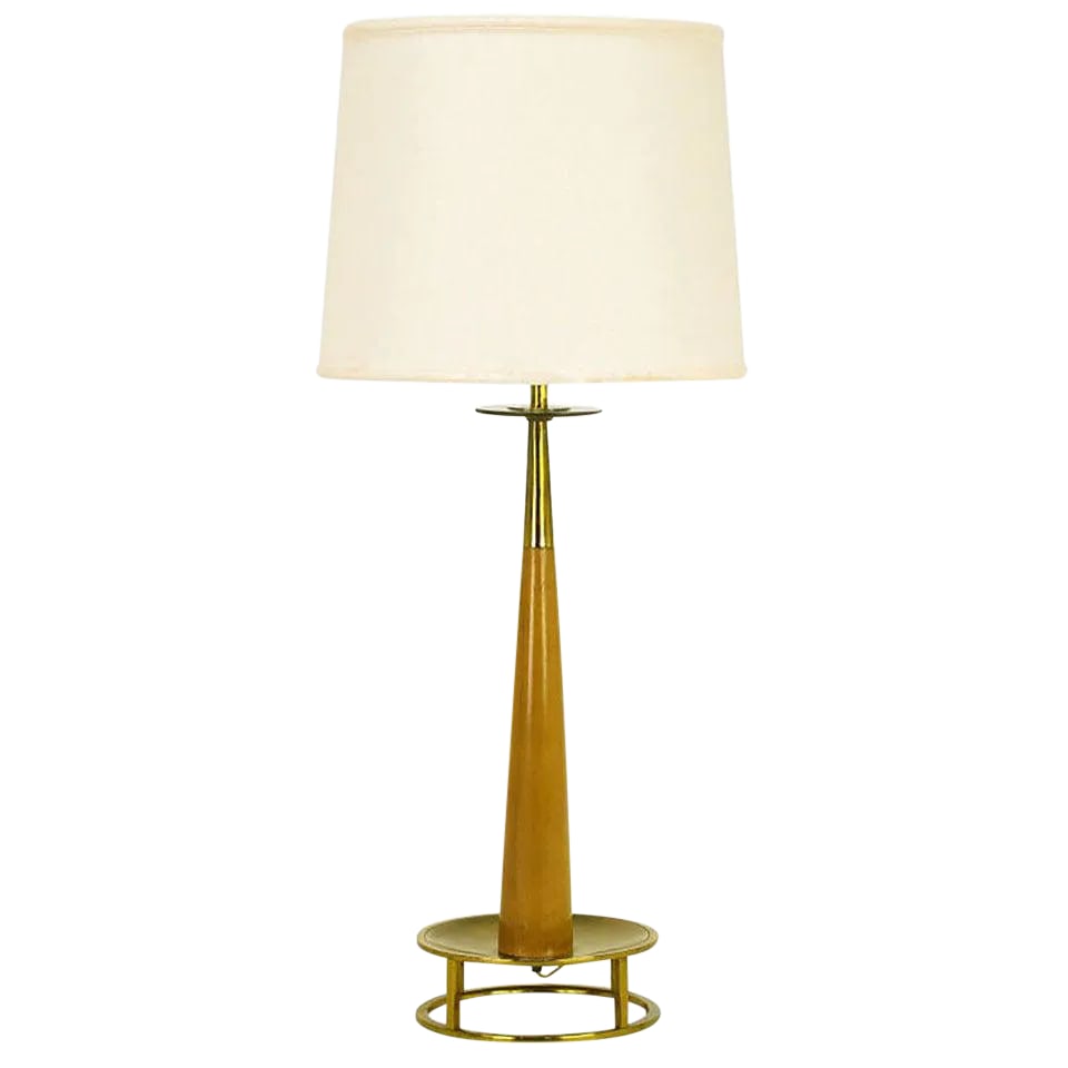 Mahogany & Brass Open Base Table Lamp Attributed to Stiffel: Exceptionally designed mahogany and brass open base table lamp by Stiffel. Tapered mahogany body topped with a brass stem and brass bobeche. Brass base is an open circle with four brass bar legs and b