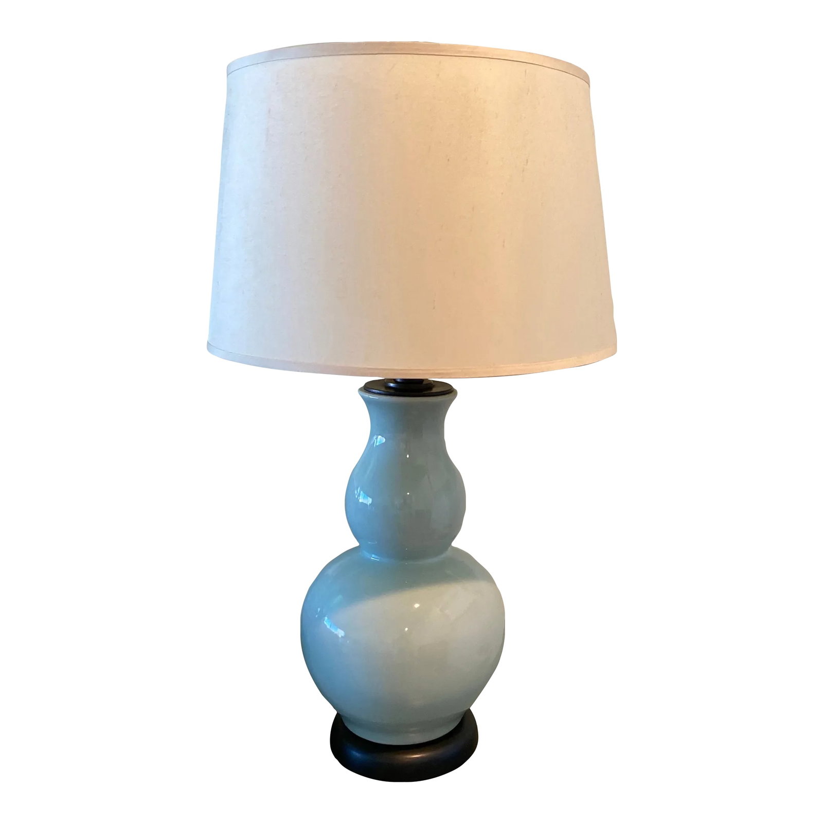 Ceramic Table Lamp Pottery Barn: Shapely, sinuous lamp lends an exotic yet elegant look to your tabletop. handcrafted robins egg blue lamp dark base while the cream colored silk drum shade adds a tailored finishing touch Condition: A