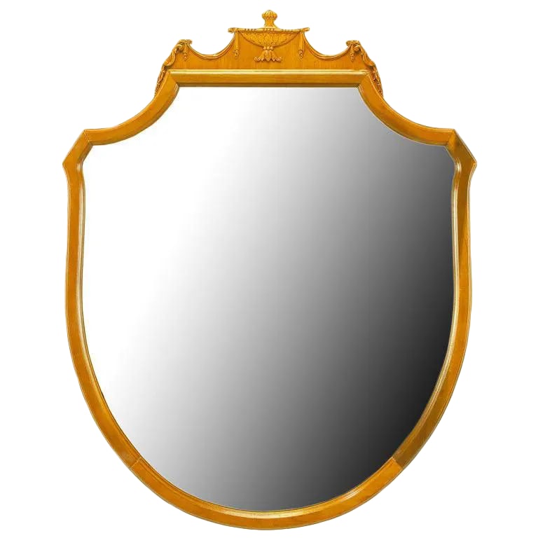Carved Walnut Shield-Form Empire Ribbon & Acanthus Leaf Mirror: Elegant carved walnut framed shield or crest mirror with top detailing. Carved acanthus leaf urn with carved ribbon swag and bows. Condition: Alterations: Original Condition Unaltered Imperfections: