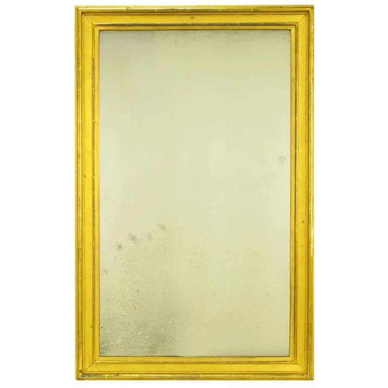 Early 1900's Parcel Gilt and Ochre Lacquered Well Aged Mirror: Very well aged parcel gilt and ochre lacquered mirror. Aged silver backing shows dark crazing and signs of stress that creates a wonderful patina. Condition: Alterations: Unknown Imperfections: Some