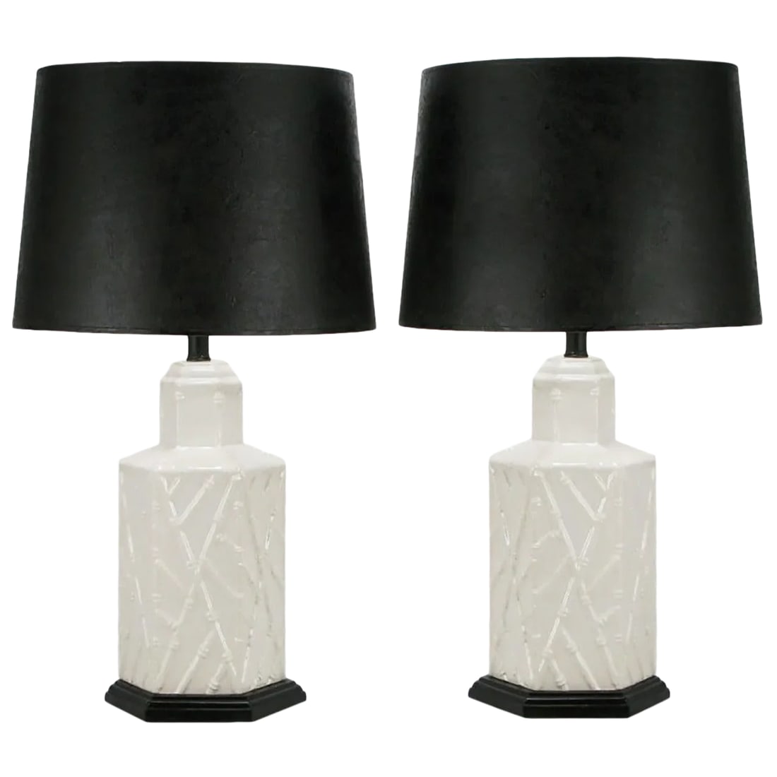 White Ceramic Hexagonal Bamboo Relief Table Lamps - a Pair: Pair of hexagonal shaped white ceramic bodied table lamps, with a patterned bamboo relief. Black lacquered and stepped hexagonal wood base and black lacquered metal and brass stems with double socket