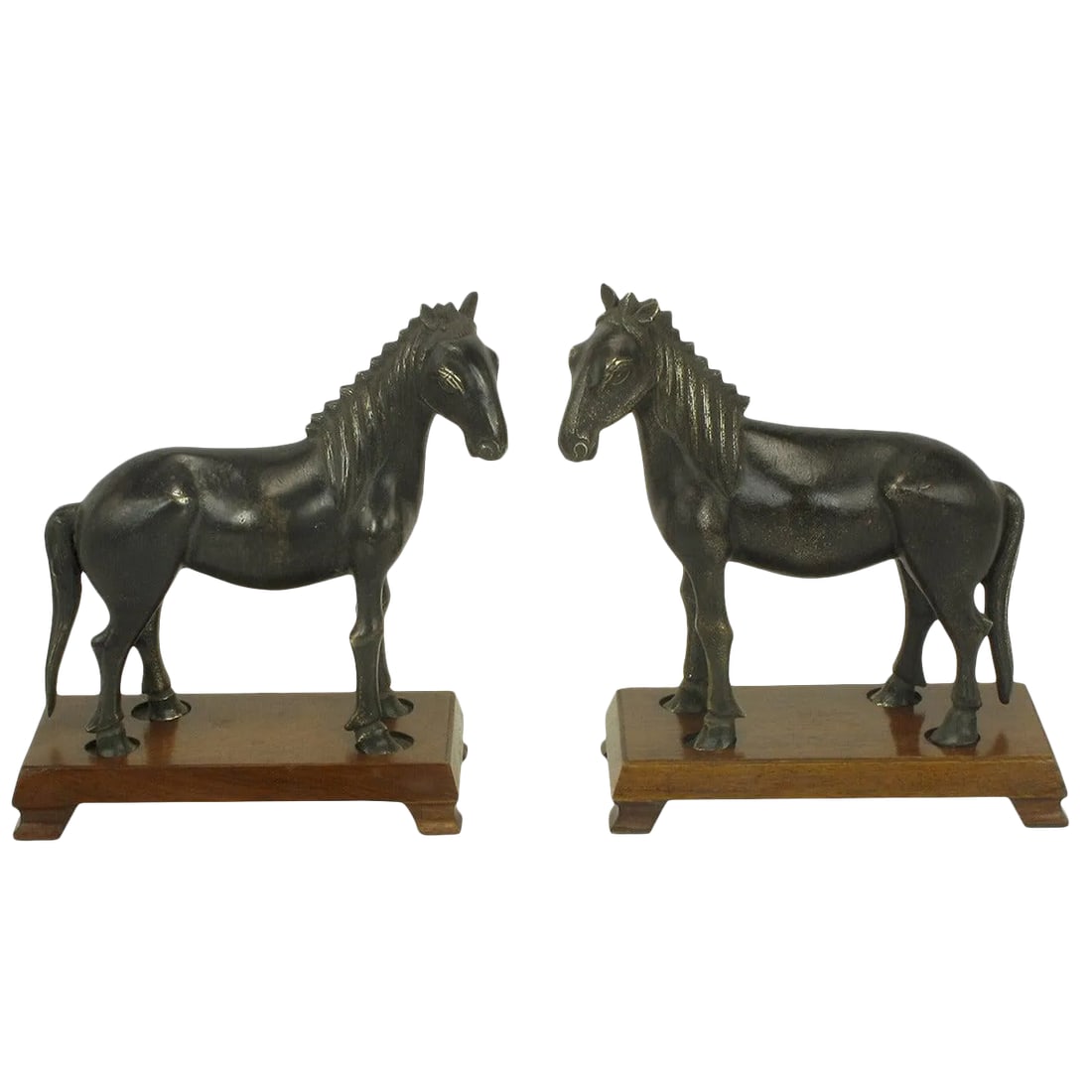 Bronze Arabian Stallion Figures Ion Footed Mahogany Plinths - a Pair: Excellent casting and color perfected by age, bronze Arabian stallions on removable mahogany footed plinths. Condition: Alterations: Unknown Imperfections: Some Imperfections Condition Notes: