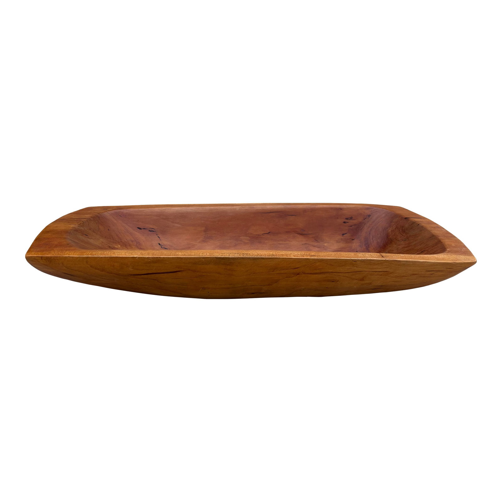 Vintage Hand Carved Long Wood Dough Bowl: 40-year-old hand-carved wood bowl from the Appalachian region, crafted from solid cherry and signed by the maker. The elongated, organic form makes it ideal for use on a dining or coffee table,