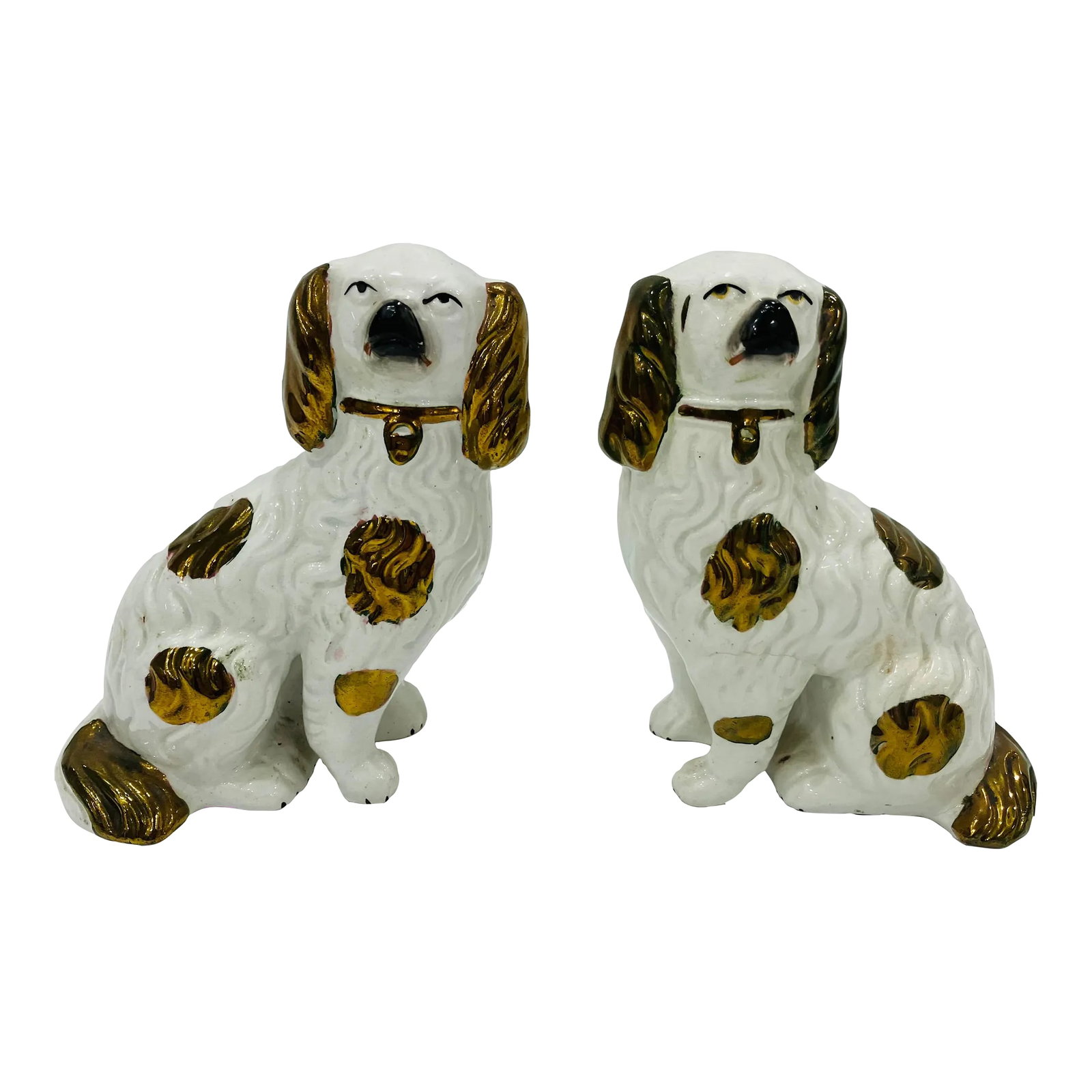 Pair of Antique Copper Luster Staffordshire Spaniels: This pair of Staffordshire dogs have copper luster decoration. There are defined paws, collars & padlocks These date from the 1890's England Condition: Alterations: Original Condition Unaltered