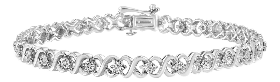 .925 Sterling Silver 1/6 Cttw Miracle Set Diamond Infinity Link and Station Tennis Bracelet - 7.25 ": You will love this elegant and timeless classic tennis bracelet with a unique alternating pattern of silver x-links and miracle set diamonds. This authentic design is crafted of real 92.5% sterling