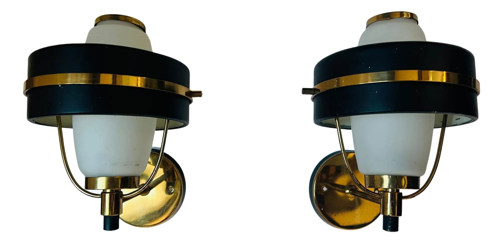 Pair of 1950s Stilnovo Italian Mid Century Wall Lights: An original pair of 1950s Italian mid century sconces in golden polished brass and black enamel with white frosted glass shades. Rewired. One 120 watt candelabra socket each. Made by Stilnovo. Conditi