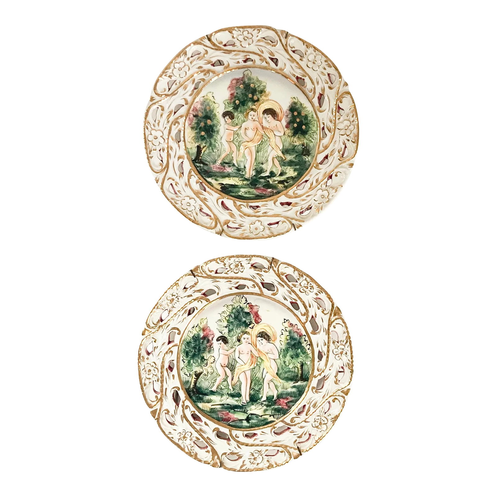Pair of Capodimonte Porcelain Decorative Wall Plates With Cherubs, 1950's: This beautiful pair of 1950's Capodimonte Italian cherub ceramic decorative wall plates are captivating, charming and timeless! Each plate is signed on back with the world renowned signature 'Capodimo