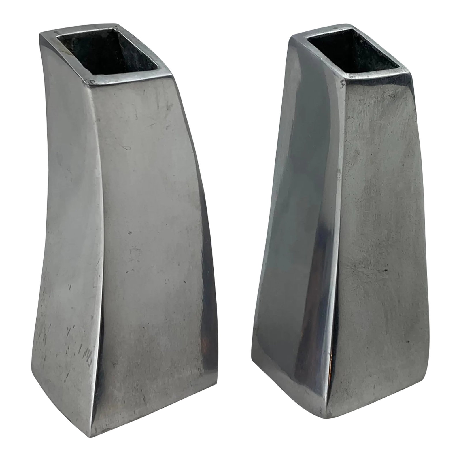 1990s Vintage Modern Aluminum Vases- Set of 2: A set of 2 vintage 1990s modern aluminum vases. Abstract square form tapering at the top with a square opening, these vases are made from thick tubular aluminum Made in India Condition: Alterations: