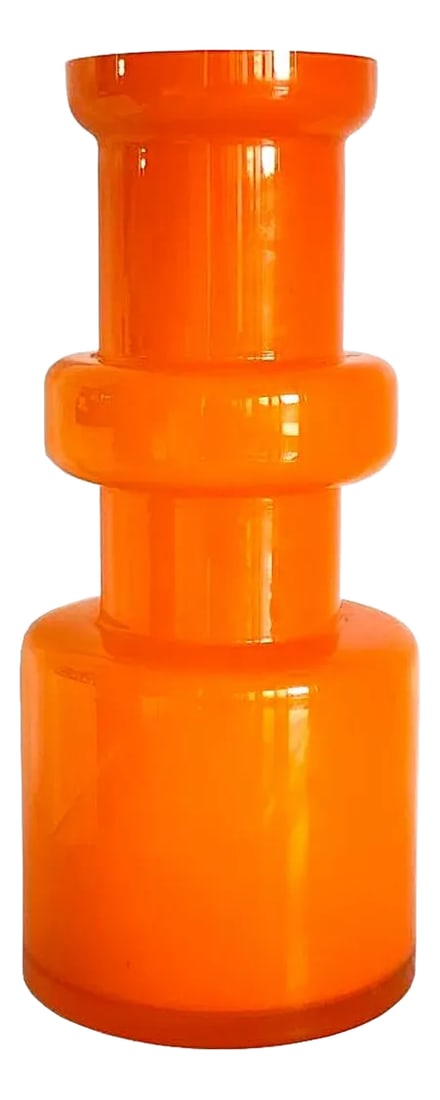 1960s Scandinavian Tall Hooped Glass Vase by Michael Bang for Holmegaard Denmark: Offered is a striking hand blown tall hooped vase in a bright hot orange art glass with white casing designed by Michael Bang for Holmegaard. It is from the 1960s and an early precursor to his