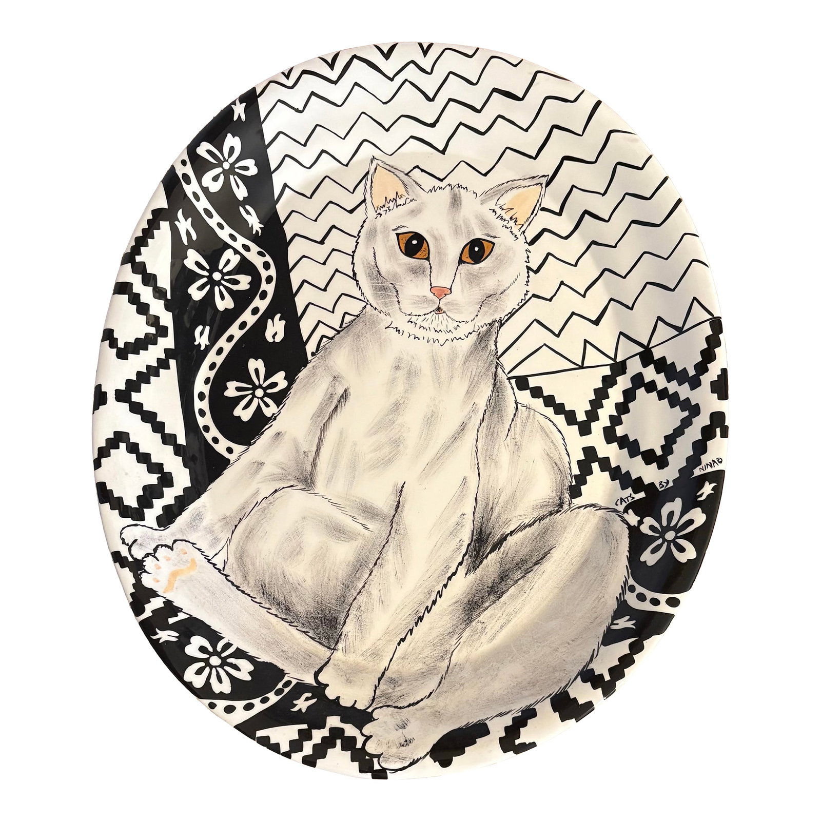 Vintage Cat Art Pottery Platter by Nina Lyman: Every Cat Lover should have one. This large platter is from Nina Lyman's "Cats by Nina" series. It's a black and white cat sitting in a black and white eccentric design. This item is no longer in