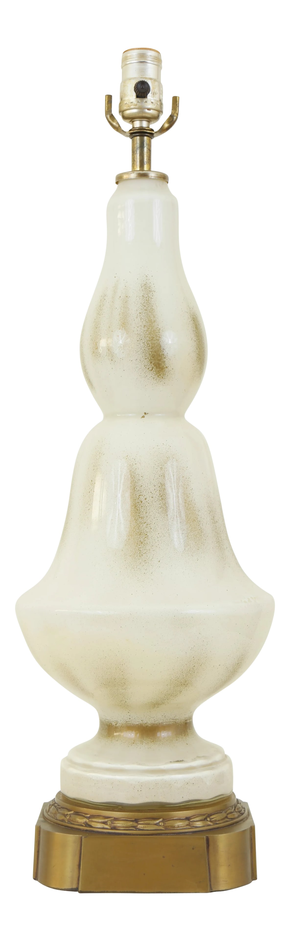 Vintage Glass & Bronze Table Lamp: This large glass bodied table lamp with bronze base will add elegant style to any home. Painted internally, from the inside, the dominant color is an off white, accented by random gold speckles. This 