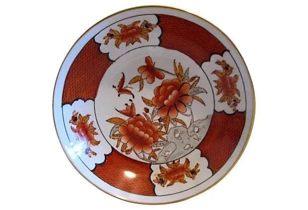 Vintage Chinese Brass-Encased Porcelain Bowl: Porcelain polished brass-encased bowl in a vibrant hand-painted floral-motif in shades of coral, tan, black, and white. Hook on back for display hanging or use as coffee table decor/catchall. Marked