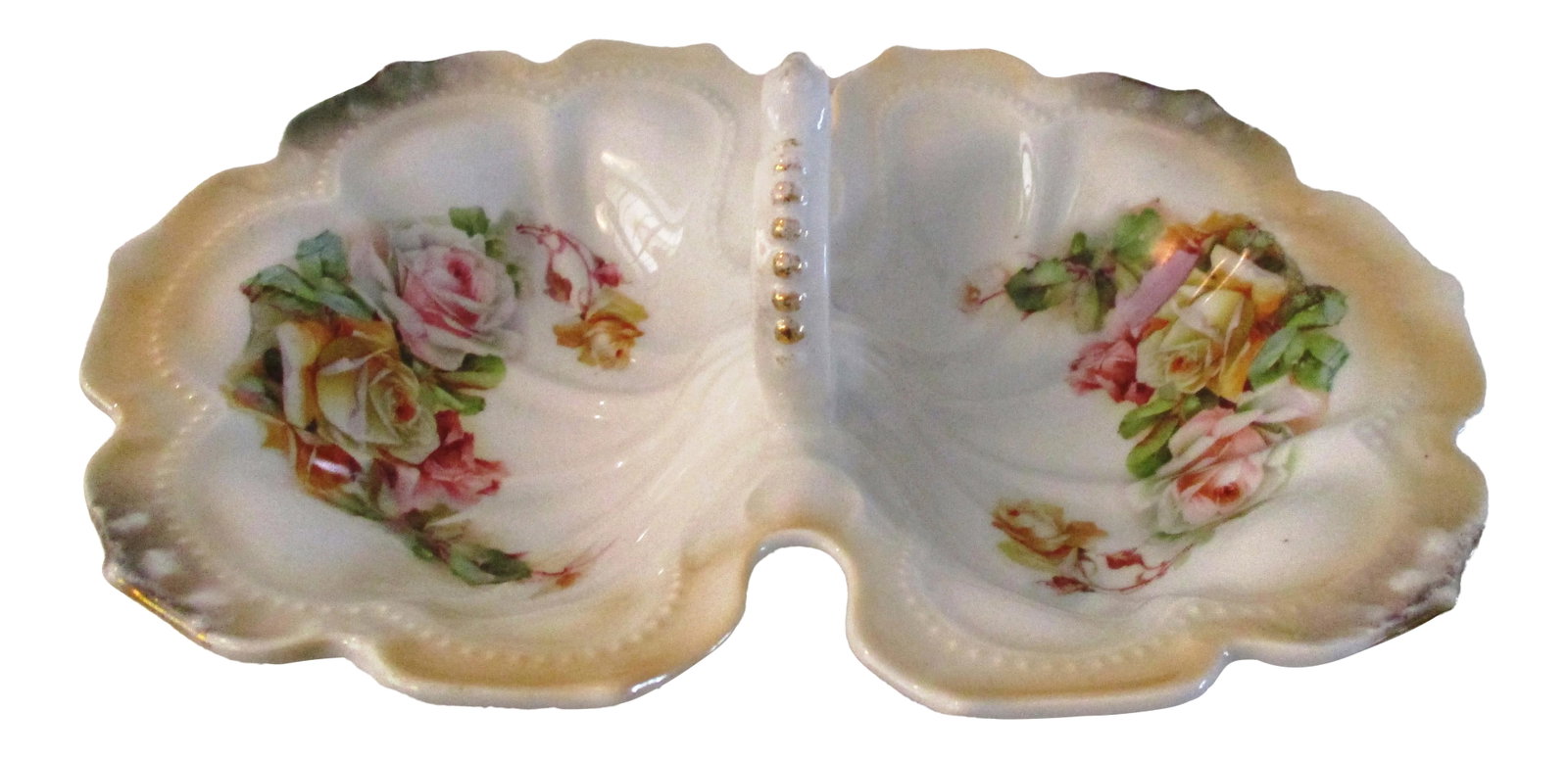 1920s German Hand-Painted Divided Floral Bowl: Beautiful German porcelain large handled divided bowl delicately hand-painted in a rose motif. Marked underside "Germany." Condition: Alterations: Original Condition Unaltered Imperfections: Some
