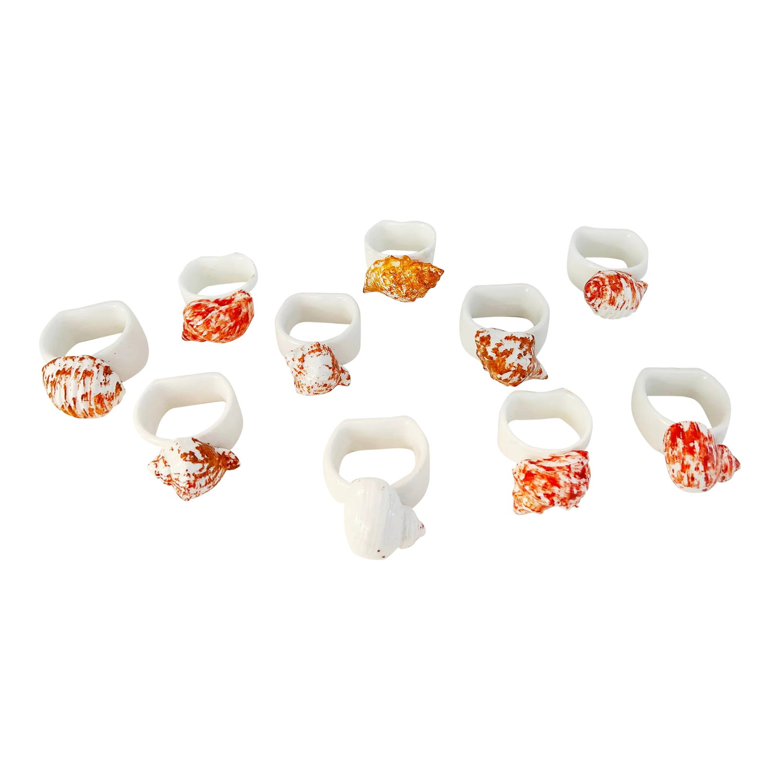 Coastal Snail Shell Bone China Napkin Rings, Set of 10: Stylish set of ten Coastal design white bone China napkin rings featuring an applied ceramic figural snail shell. Condition: Alterations: Original Condition Unaltered Imperfections: Some