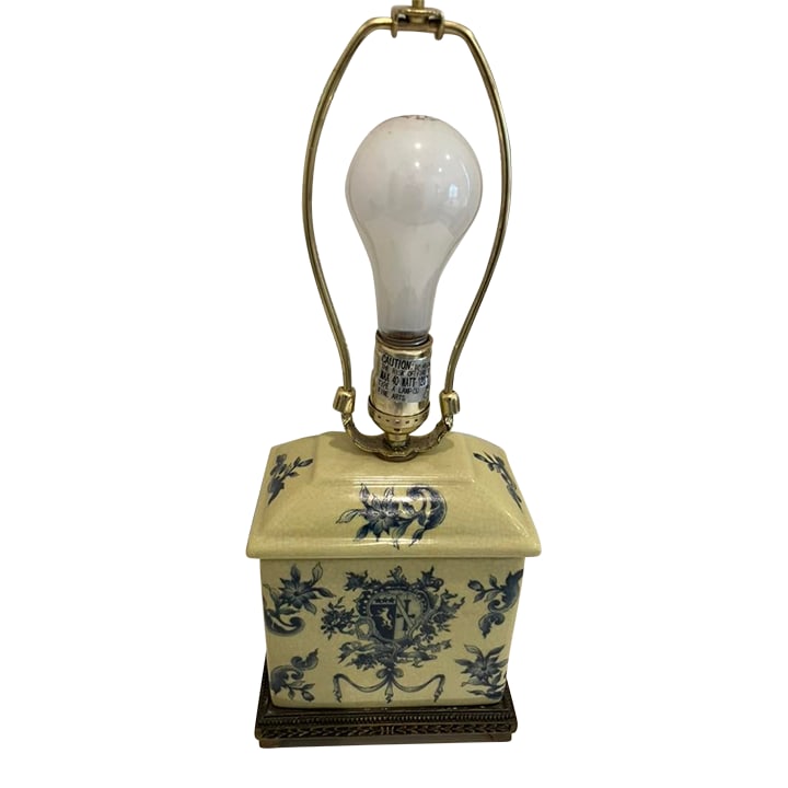 Vintage Blue & White Porcelain Lamp With Crest Motif on Brass Base, 1960s-1970s: Elegant vintage porcelain lamp featuring a blue floral and heraldic crest motif on a cream crackle-glazed body, mounted on a decorative brass base. Likely dating from the 1960s-1970s and imported