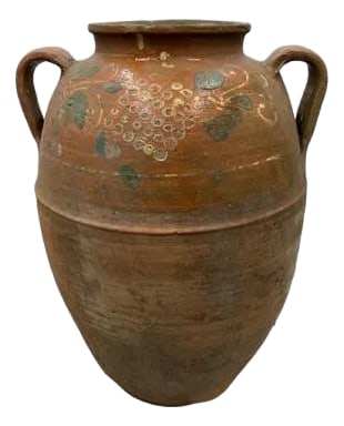 Antique Terracotta Jar: This antique terra cotta vessel from Hungary is a wonderful addition to any Farmhouse decor. The rustic pottery showcases a subtle hand-painted Hungarian Folk Art design peaking through the natural