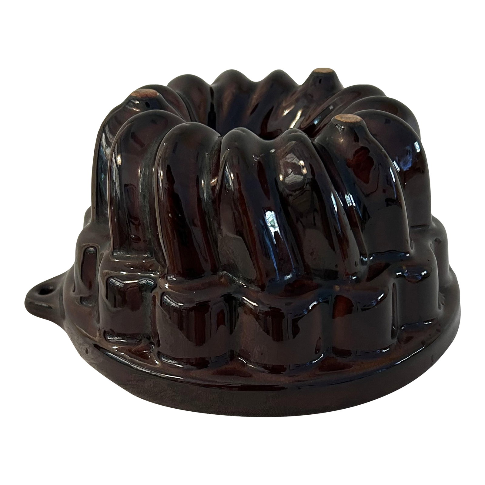 Vintage German Ceramic Brown Glazed Gugelhupf: Vintage German glazed ceramic bundt cake mold in dark brown. Condition: Alterations: Original Condition Unaltered Imperfections: Some Imperfections Condition Notes: minor wear Origin: Germany
