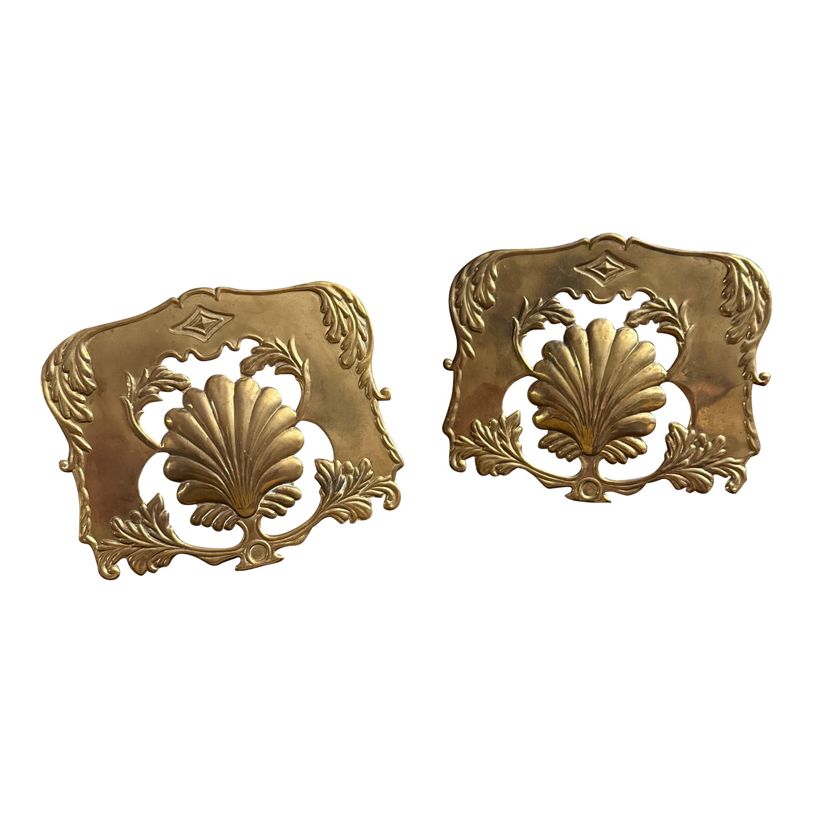 Pair - Brass Candle Shade With Embossed Shell: Georgian / Early American style embossed brass clip on shade deflector for taper candle. Acanthus foliage, diamond lozenge, and shell motif. From a house restored by Jim Williams Savannah Georgia