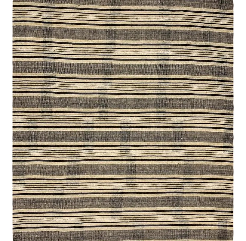 1960s Beige/Brown Persian Kilim Area Rug 13'0" X 13'2": This fun rug is a beautiful flatweave Persian Kilim area rug. The lightweight construction makes this tribal rug an excellent choice for a day at the beach or even an afternoon picnic in your