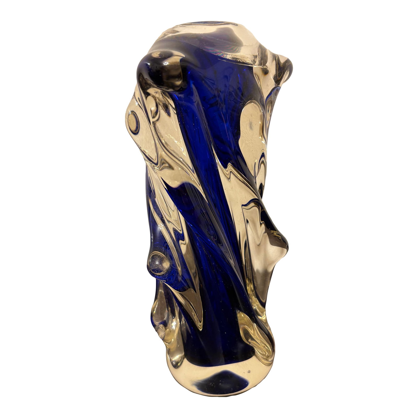 Murano Cobalt Blue Diminutive Vase: This piece of hand blown piece of Murano vintage glass, has the traditional caps of waves represented throughout the entire vase that is clear glass with cobalt blue that is the center of the vase.