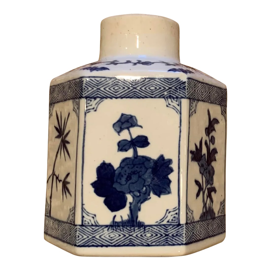 1950s Small Blue and White Japanese Hexagon Vase: Antique Small Japanese painted blue and white ceramic hexagon vase with small round top opening. Condition: Alterations: Original Condition Unaltered Imperfections: Some Imperfections Condition