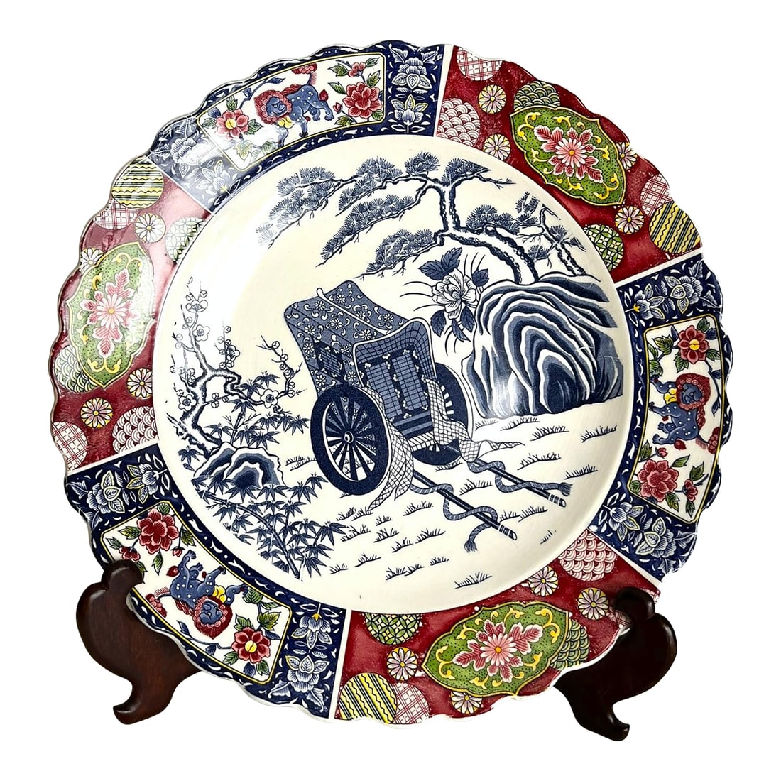 Early 20th Century Imari Charger: The object is a Japanese Imari charger from the late Meiji to early Tasho Period in the early 20th century. It is a high quality later Imari revival piece made for export. The central scene is a tradi