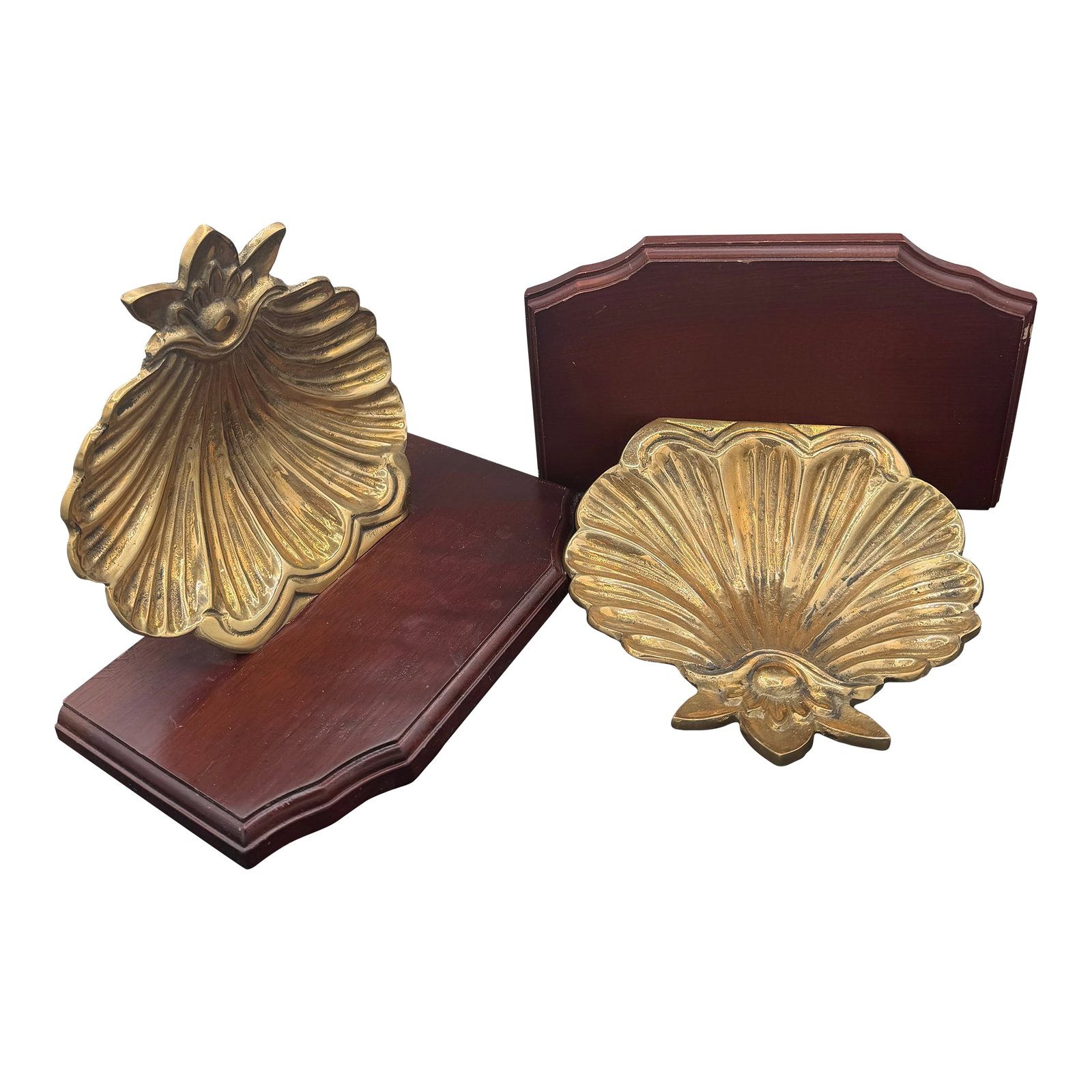 1980s Pair of Brass and Mahogany Shell Wall Brackets: A very nice pair of vintage wall brackets or shelves. Each with a brass base depicting a large shell and the top is in mahogany Condition: Alterations: Original Condition Unaltered Imperfections: