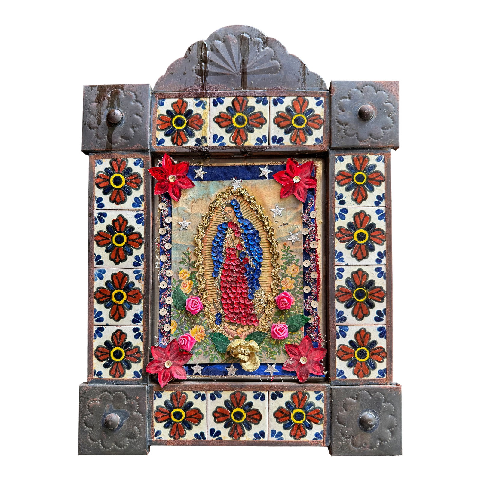 Large Mexican Folk Art Niche With Mission Style Tile and Pressed Copper Frame: This vintage Mexican nicho shrine is a mixed-media devotional work assembled from metal, paper, and applied decorative elements including sequins, metallic trim, and fabric. Pieces like this were trad