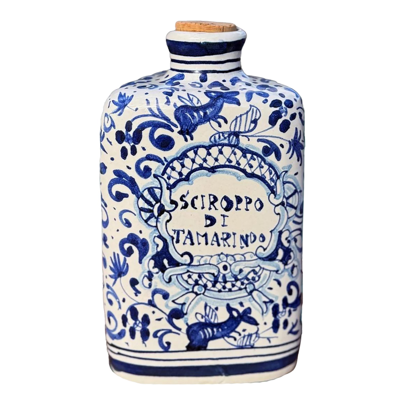 Italian Maiolica Apothecary Jar, Triangular Form, Cobalt Blue & White Pharmacy Vessel: An uncommon Italian maiolica apothecary jar in a striking triangular form, hand-painted in saturated cobalt on a crisp white ground. The central cartouche reads Sciroppo di Tamarindo (tamarind