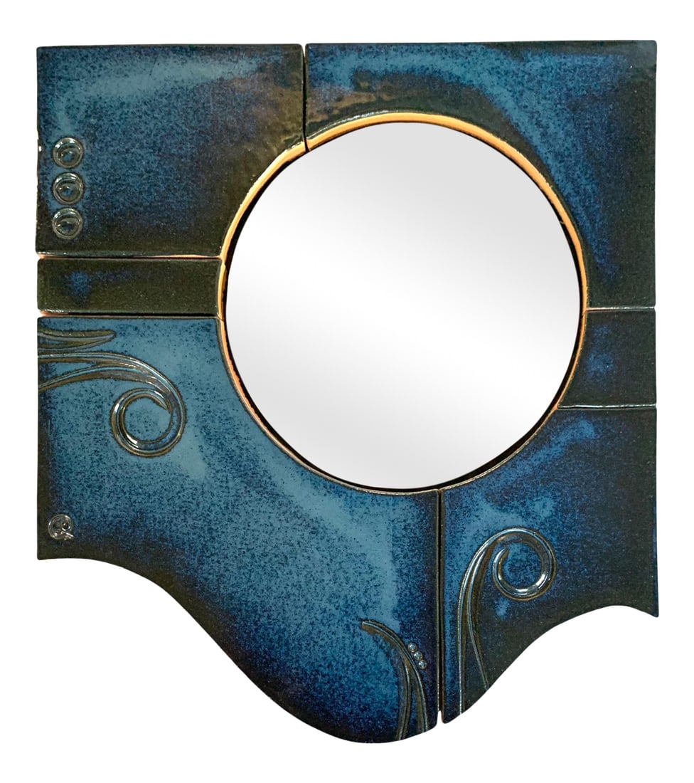 Late 20th Century Handcrafted Ceramic Wall Mirror: Late 20th century decorative wall mirror. This ceramic piece is of ornamented sections of glazed clay in a greenish cobalt blue tone. Is signed by the artist on the reverse: "Leanne Sedona 4-97"